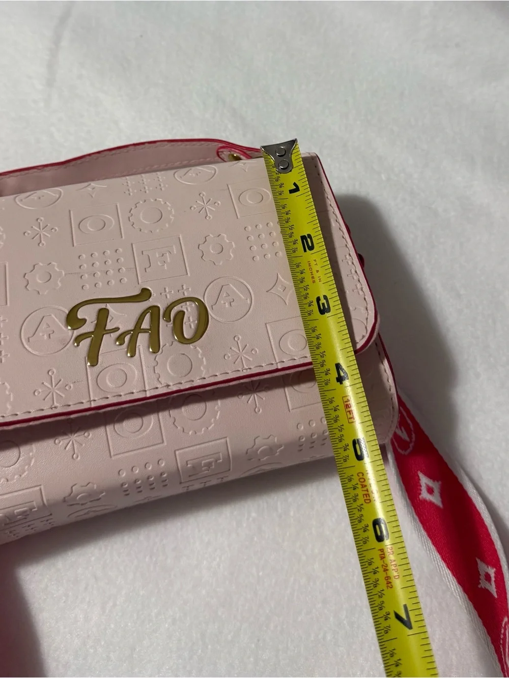 FAO Schwarz Blush Pink Embossed Crossbody Bag Red Strap Frog Hand Puppet